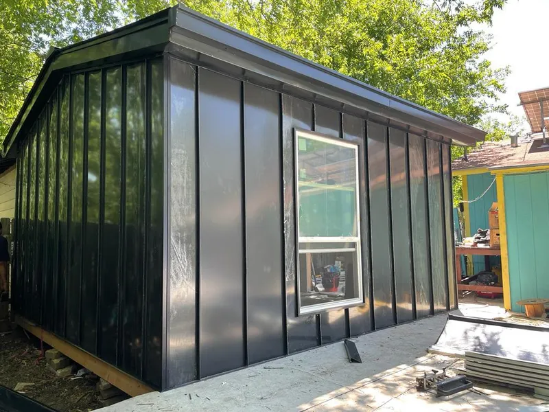 Black standing seam metal wall panels for Roof Inspection in Erie